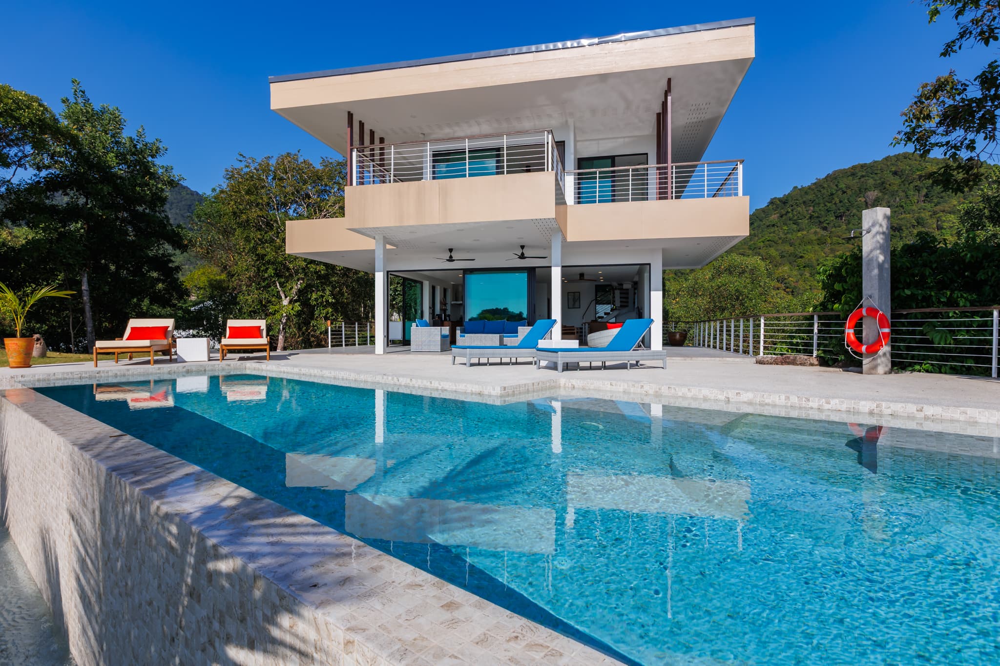 Infinity pool facing the villa and green hills, Hin Kong Bay, Koh Phangan